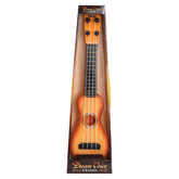 Sunburst wood ukulele with black fretboard and four strings in packaging, musical instrument.