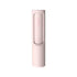 Minimalist pink cleaning brush with sleek cylindrical design, compact plastic body