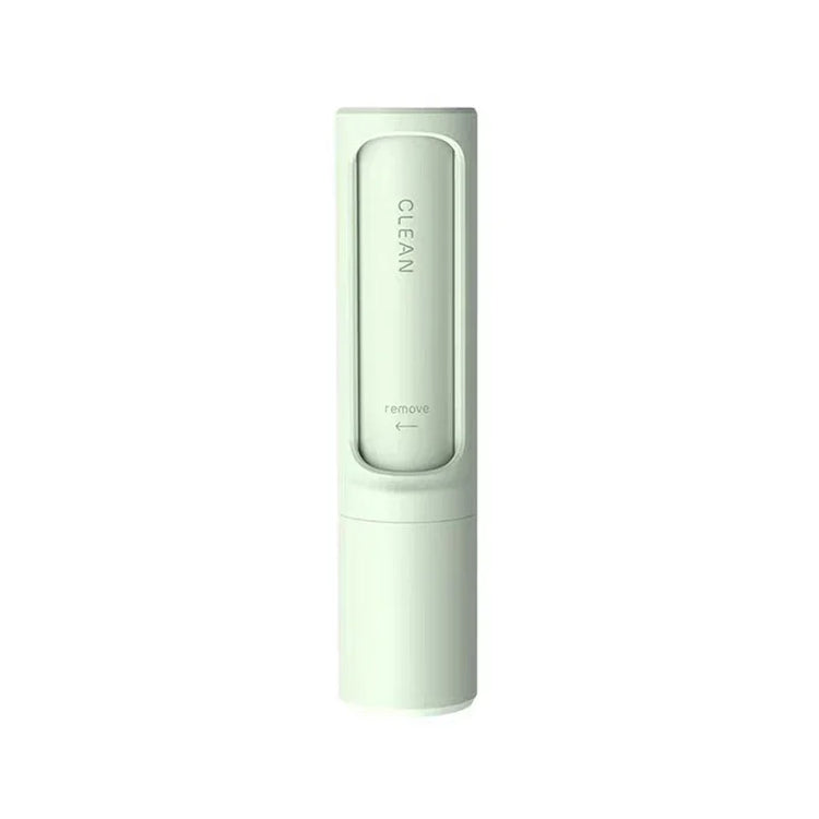Minimalist white portable cleaning brush with sleek cylindrical design on white background