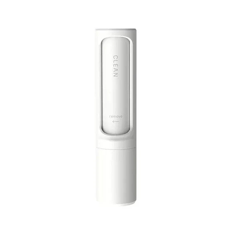 Minimalist white portable lint remover with smooth, sleek plastic design