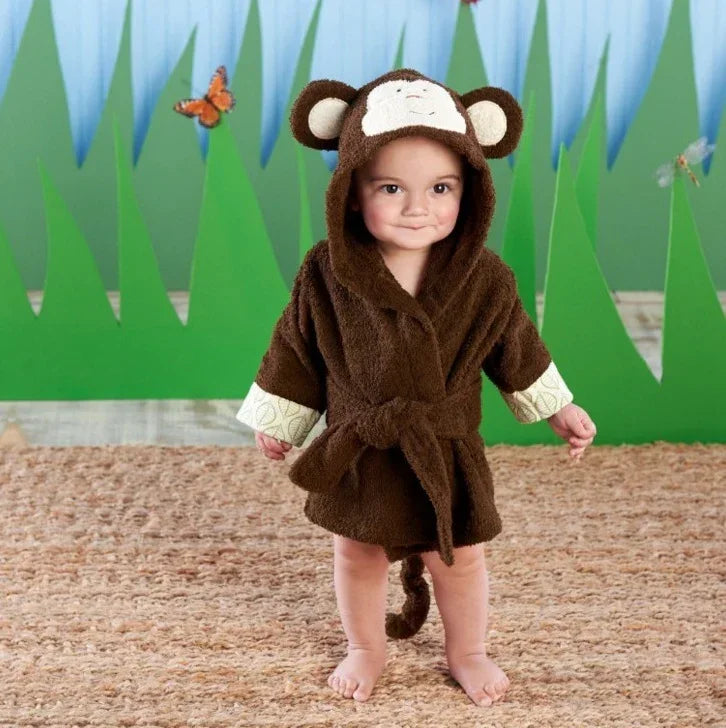 Baby wearing brown hooded monkey costume robe with cute ears, soft plush fabric, relaxed fit
