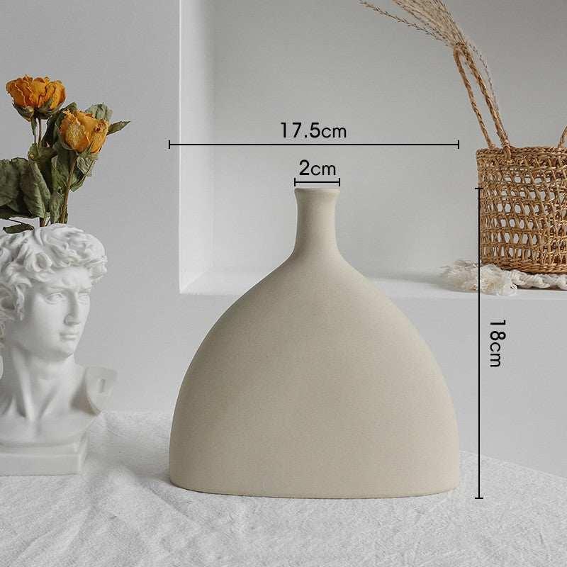 Minimalist beige ceramic vase with narrow neck, dome shape, 17.5cm wide and 18cm tall