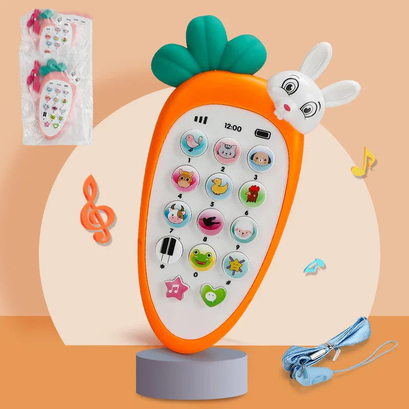 Orange carrot-shaped toy phone with animal buttons, bunny head, and lanyard on neutral background.