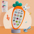 Orange carrot-shaped toy phone with animal buttons, bunny head, and lanyard on neutral background.