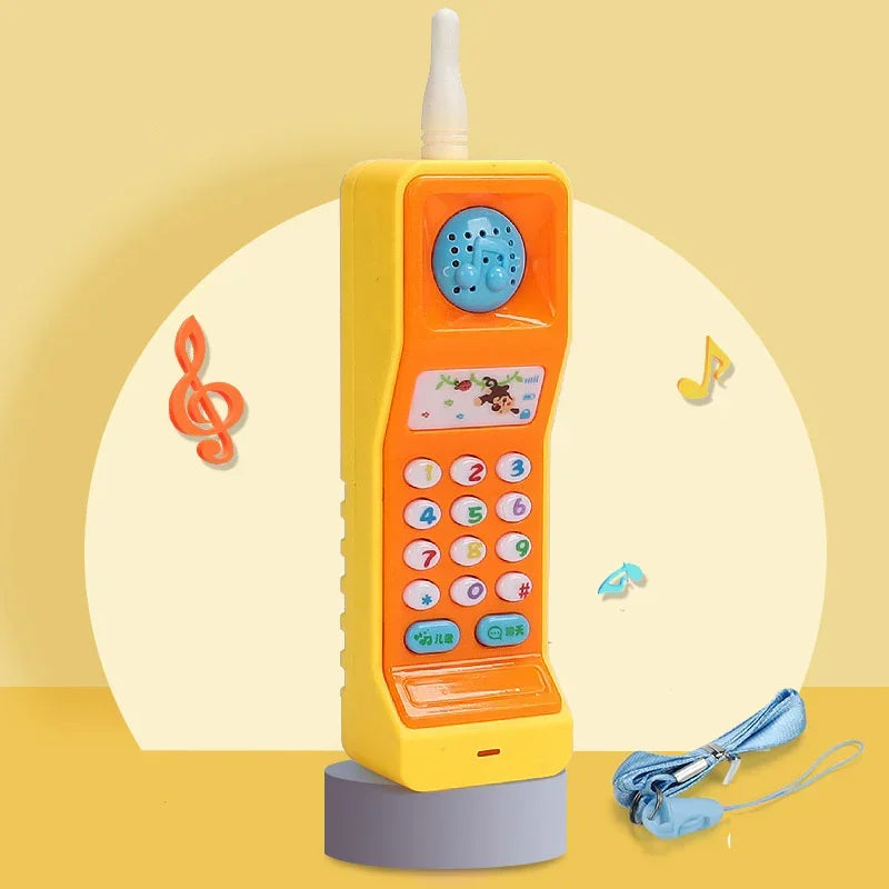 Yellow and orange retro toy phone with colorful buttons, musical notes, and blue lanyard