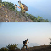 Hiker in loose-fit green cargo pants, lightweight shirt, camouflage hat, and outdoor gear climbing a hill
