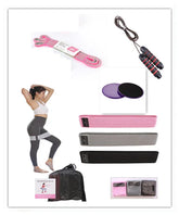 Woman in high-waisted grey leggings and white sports bra with resistance bands, fitness accessories.