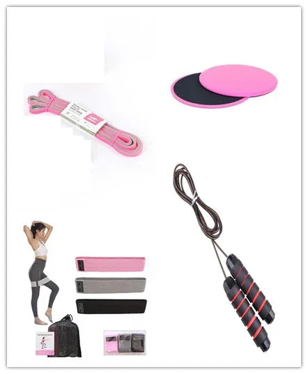 Activewear set with pink, black, and gray resistance bands, jump rope, and core sliders for workouts