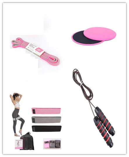 Activewear set with pink, black, and gray resistance bands, jump rope, and core sliders for workouts