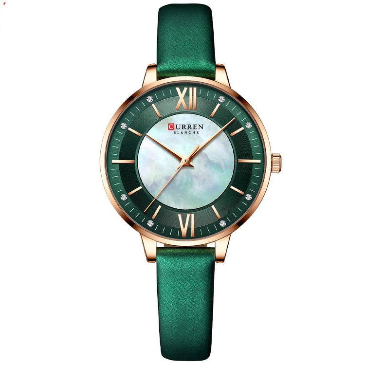 Elegant green leather strap watch with gold case and marble face, Roman numerals, slim fit.