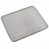 Gray quilted mat with circular texture and stitched border, soft padded surface