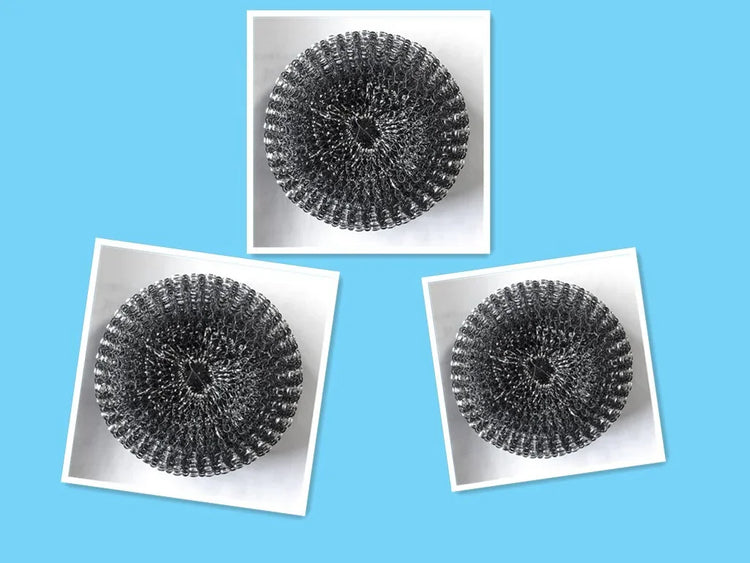 Three round metal mesh scrubbers with spiral pattern, displayed on a blue background.