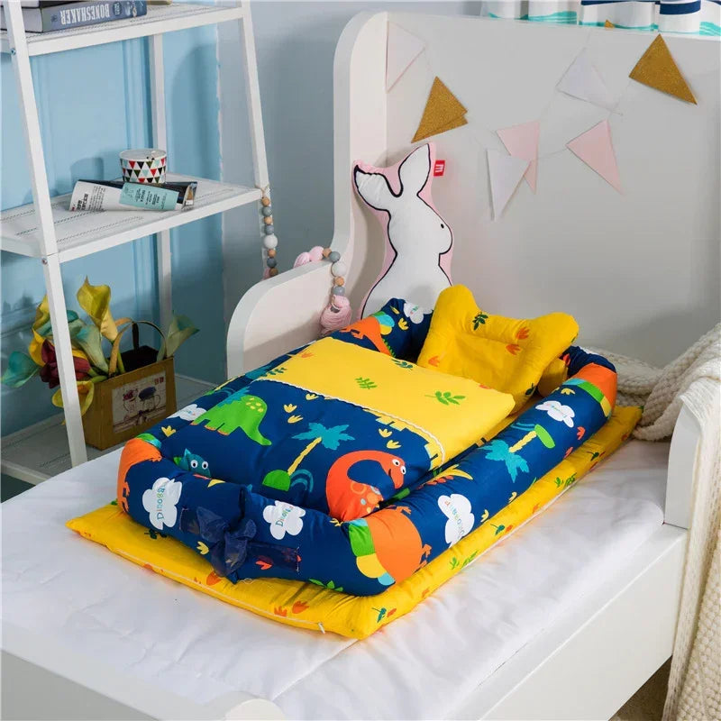 Colorful dinosaur print bedding set with soft yellow and blue fabric, displayed on a child's bed.