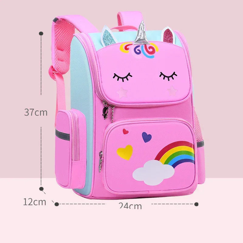 Pink unicorn backpack with rainbow print, heart accents, mesh pockets, and adjustable straps