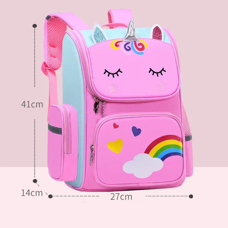 Pink unicorn backpack with rainbow and heart prints, glitter ears, side pockets, and soft straps