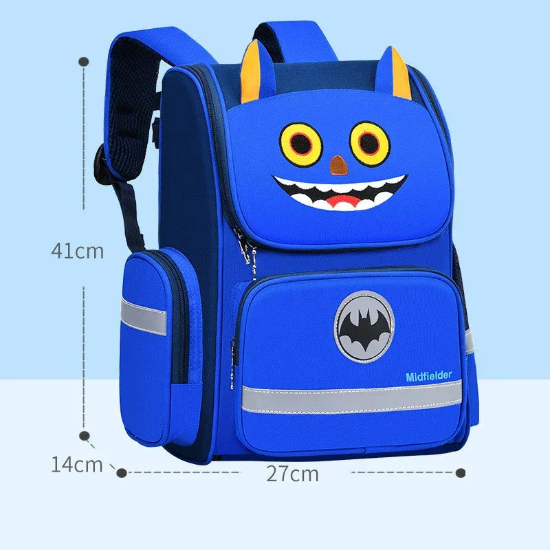 Blue kids backpack with cartoon monster face, bat logo, reflective stripes, and measurements