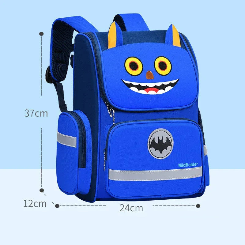 Blue kids backpack with playful monster face, yellow ears, reflective accents, and side pockets.