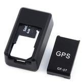 Black compact GPS tracker with removable cover and visible microSD card slot