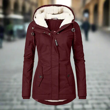 Burgundy women's winter jacket with hood, fleece lining, slim fit, and button details