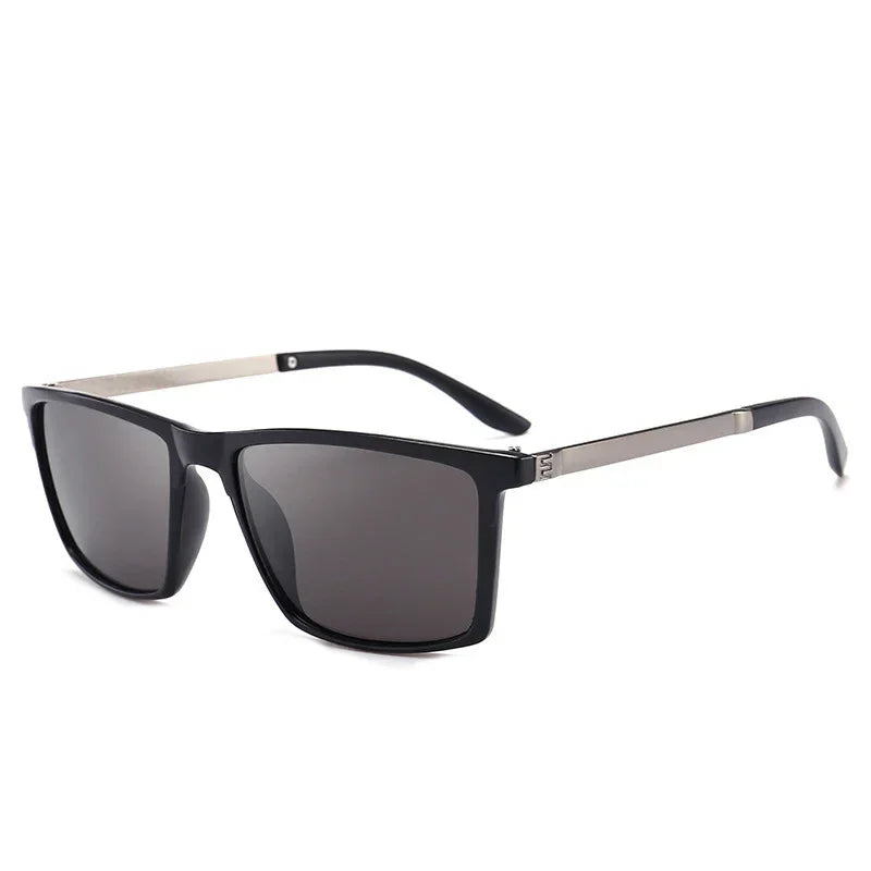 Black square-frame sunglasses with dark lenses and metallic temples, modern streetwear style
