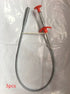Flexible metal drain clog remover with red plastic handle and spring-loaded grip
