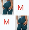 Teal textured high-waist leggings with sculpting fit, stretchy material, and seamless design for active wear