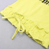 Yellow ruffled crop top with adjustable tie hem, soft cotton fabric, slim fit