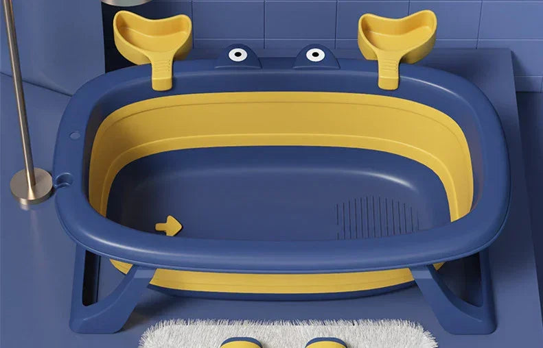 Blue and yellow plastic kids' bathtub with animal-themed handles, modern playful design.