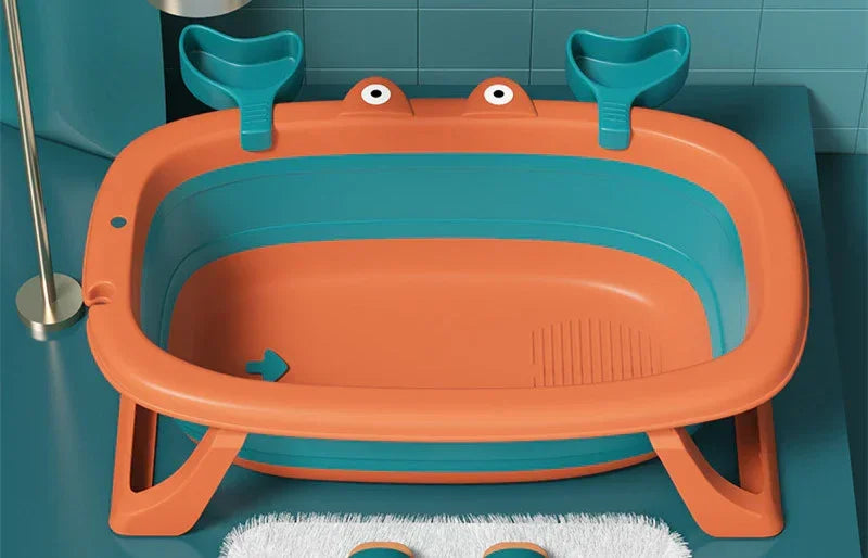 Orange and teal plastic bathtub with cartoon eyes, modern design and sturdy legs