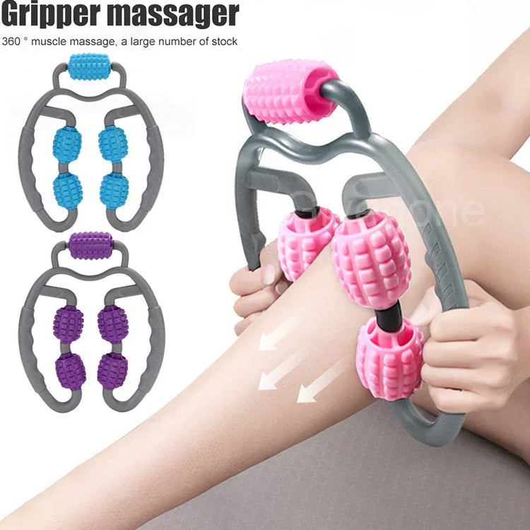 Handheld gray plastic roller massager with pink textured wheels used on bare leg
