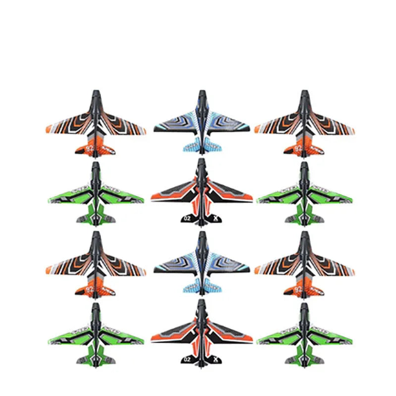 Colorful foam toy glider jets in orange, blue, green, and black geometric patterns