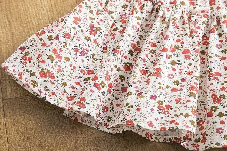 White floral cotton skirt with red and pink flowers, A-line fit, flowy and lightweight style