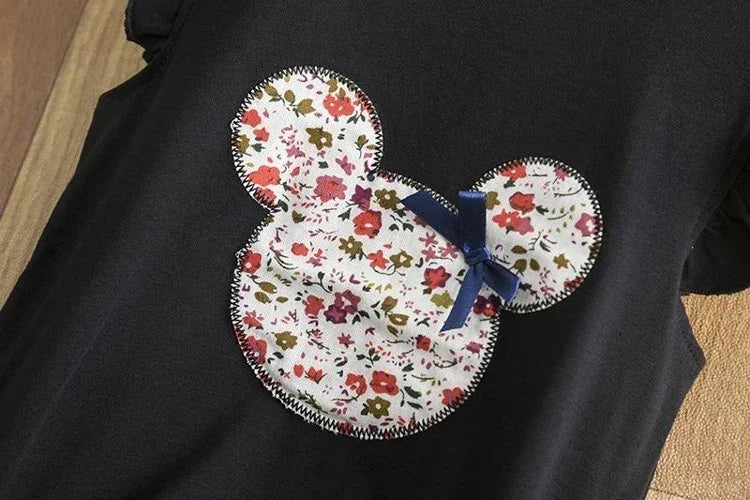 Black cotton shirt with floral mouse head applique and navy bow, relaxed fit