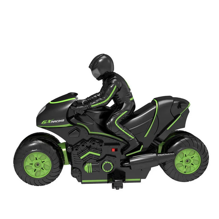 Black and green race motorcycle toy with rider in matching sleek, futuristic suit