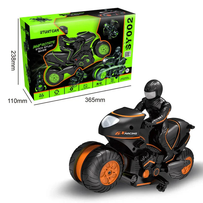 Black and orange remote control stunt motorcycle toy with racer figure and product box.