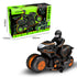 Black and orange remote control stunt motorcycle toy with racer figure and product box.