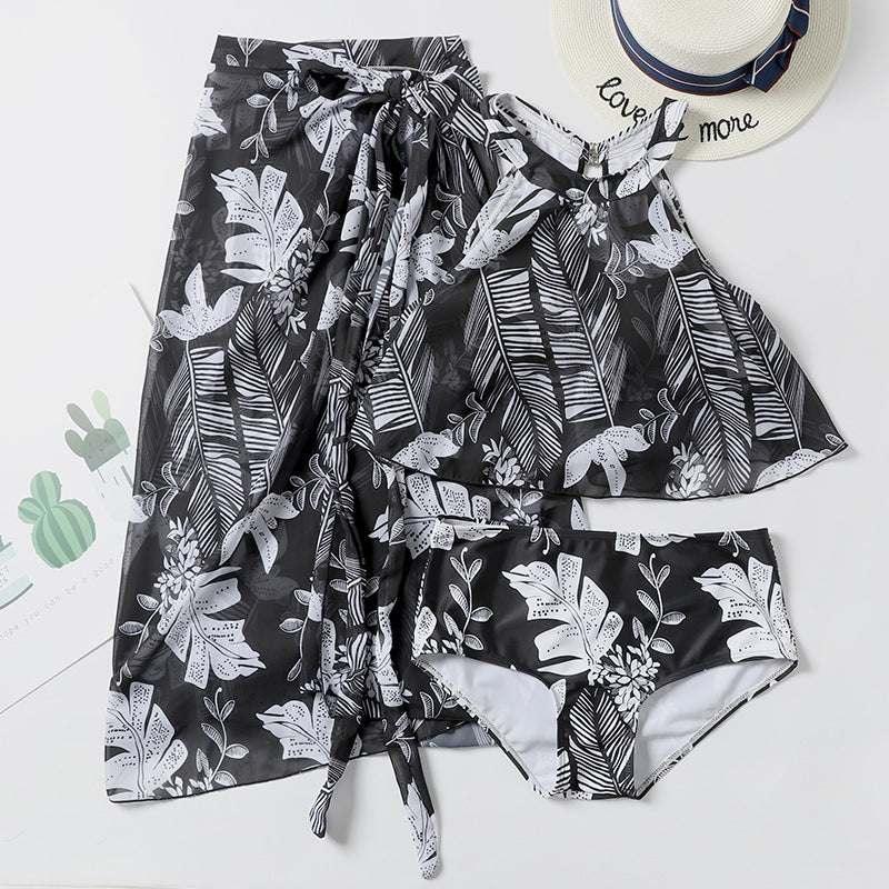 Black and white tropical floral print crop top, skirt, and swim bottom set, lightweight fabric, relaxed fit