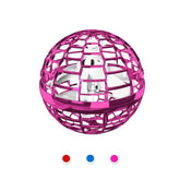 Futuristic metallic pink spherical gadget with geometric openwork design, tech accessory