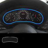 Car dashboard with blue LED trim accent, analog gauges, sleek black finish, modern fit