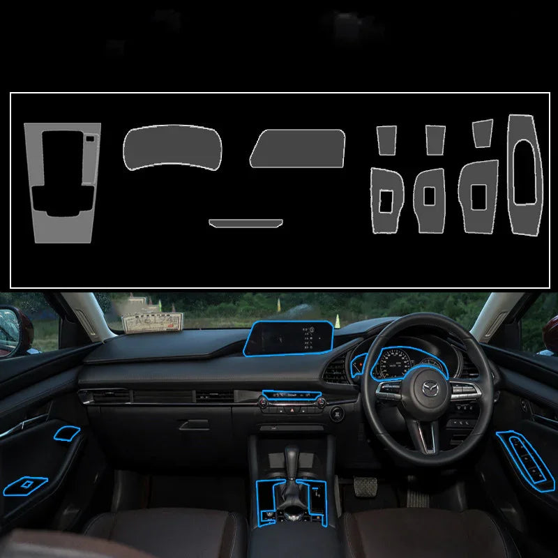 Black car interior dashboard and controls with blue-trim accessories, modern layout