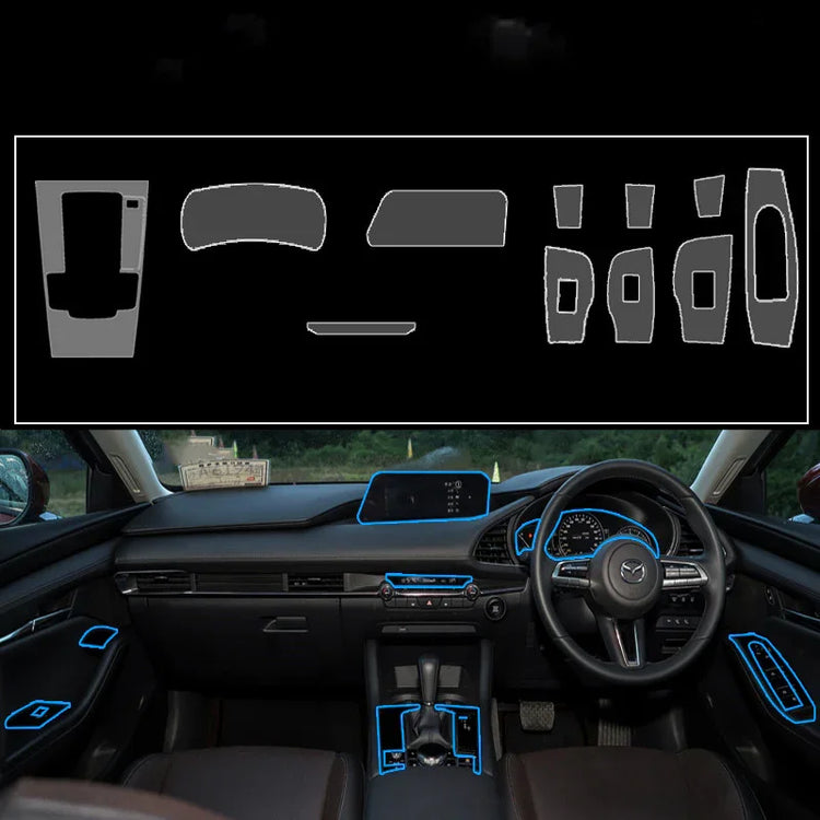 Black car interior dashboard and controls with blue-trim accessories, modern layout