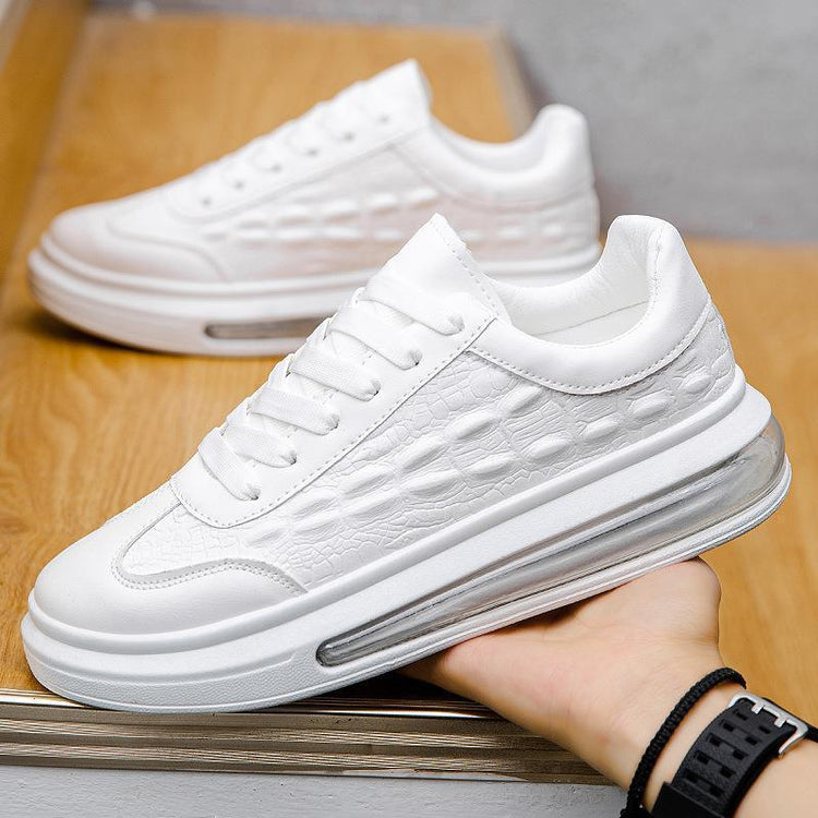 White textured low-top sneaker with clear sole and chunky fit, modern streetwear style