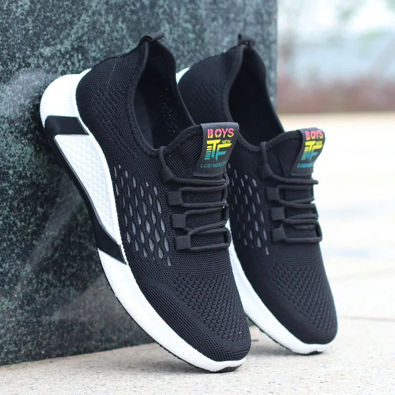 Black mesh knit sneakers with white soles, lightweight breathable athletic fit
