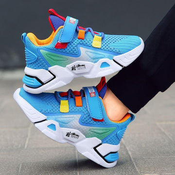 Blue mesh kids sneakers with chunky white sole, colorful accents, and adjustable straps