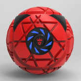 Futuristic red geometric ball with black and blue accents, textured surface, and angular design.