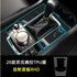 Black leather car gear shift with metallic control dial and glossy panel, TPU cover outlined in blue.