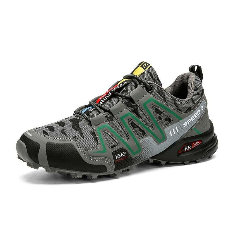 Gray and green athletic sneaker with mesh upper, rugged sole, and camouflage details, low-top fit