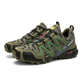 Camouflage-patterned, green and black athletic sneakers with rugged sole and mesh material.