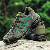 Green camo trail running shoes with mesh panels, rugged sole, and athletic outdoor fit