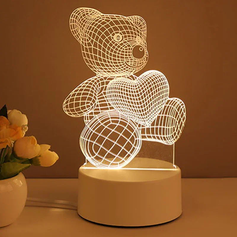 3D illusion LED night light featuring a glowing bear holding a heart, on a white base
